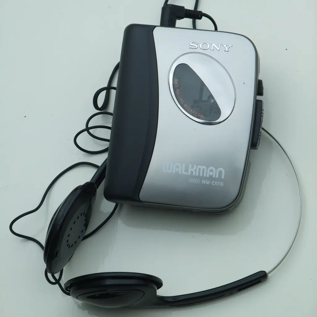 A Sony Walkman cassette player with its headphones.